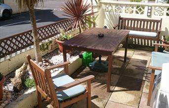 Seating area outside at Brampton Guest House, Paignton, Devon