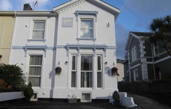 Front of house and car park area at Serendipity Guest House, Torquay, Devon