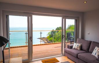 Lounge with sea view from Osprey 2, The Cove, Brixham