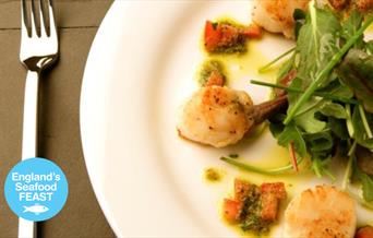 Seafood with scallops dish prepared by Cary Arms & Spa. Part of England's Seafood FEAST.