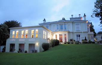 Howden Court Hotel at dusk, Torquay, Devon