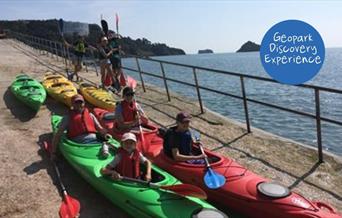 Kayaks waiting to be launched, Geology, Wildlife and Cave Kayak Tour - Sea Kayak Torbay