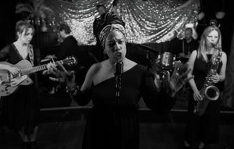 Lady Nade sings Nina Simone: A celebration of Nina Simone’s Legacy, Palace Theatre picture of a singer and backing artists