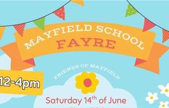 Mayfield School Summer Fayre picture of a fairground carousel.
