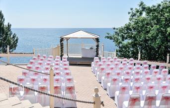 The Osborne Hotel Wedding Fair picture of outside seating overlooking the Meadfoot Beach