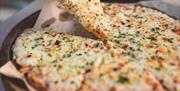Sliced pizza from Pizza Nation