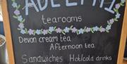 A frame outside shop, Adelphi Tearoom, Paignton