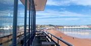 Balcony overlooking Paignton Beach at Shoreline Restaurant, England's Seafood Feast