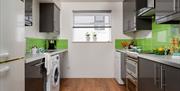 Kitchen area at Palm Grove Apartments, Torquay, Devon