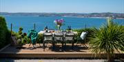 Al fresco dining at Vane Tower overlooking Tor Bay