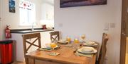 Dining area and kitchen, Plover 3, The Cove, Brixham Devon