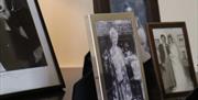 photo of the outside of greenway House and a picture of phographs on a piano