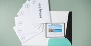 Surprise Trip Pack laid out with all the envelopes