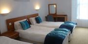 Bedroom in a self-catering apartment at Ansteys Lea, Torquay, Devon