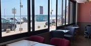 The view of Costa Coffee Quaywest, overlooking Goodrington Sands beach.