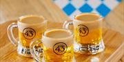 Drinks served during Oktoberfest at The Bull and Bush Torquay