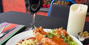 Meal and wine served at Cinco Gatos, Torre, Torquay