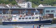 Dart Venturer embarking passengers at Fish Quay, Brixham