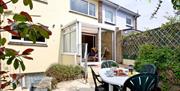 Patio with outside seating, Harbour View, 8 Jacolind Walk, Brixham, Devon