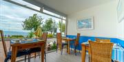 Breakfast room with view at Headland View, Babbacombe, Torquay, Devon
