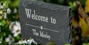 Welcome to The Morley sign