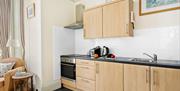 Kitchen area of Roma apartment