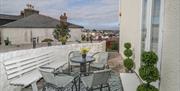 Patio seating at Hilltop, Jubilee Terrace, Paignton