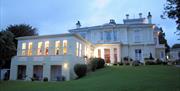 Howden Court Hotel at dusk, Torquay, Devon