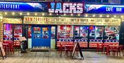 Jacks frontage in red white and blue and pictures of the food and drinks