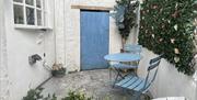 courtyard with table and seating for two