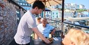 Service on the balcony at Old Market House, Strand, Brixham
