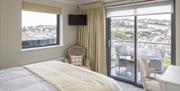 Bedroom & balcony at Driftwood Boutique B & B, Brixham, Devon