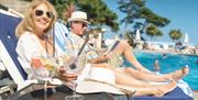 Lounging by the swimming pool at Osborne Apartments, Torquay, Devon