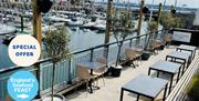 Outside seating overlooking Torquay Harbour at Otto