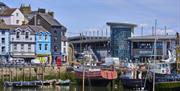 View across Brixham harbour to Rockfish restaurant