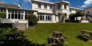 Garden with lawns and seating at the Devonshire Hotel in Torquay