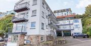 Exterior and car park, 10 Dolphin Court, Overgang, Brixham, Devon