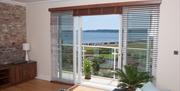 Lounge and view, The Penthouse, Goodrington Lodge, 23 Alta Vista Road, Paignton, Devon