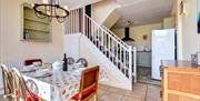 Dining area and kitchen, Polly's Place, 25 Prospect Road, Brixham, Devon