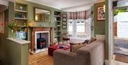 Lounge, Polly's Place, 25 Prospect Road, Brixham, Devon