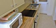 Kitchen area at Redsands Villa Apartments, Paignton, Devon