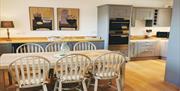 Dining area and kitchen, Seaview Cottage Number 7, Cary Arms, Babbacombe, Torquay