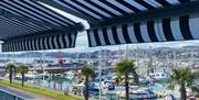 The Yacht, pictures of the bar and restaurant, breakfast, afternoon tea, lunch, dinner champagne bar, gin lounge, distillery