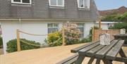 Decking and outside seating area, Three Beaches Holiday Apartments, Paignton, Devon