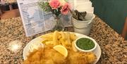Fish and Chips served at The Usual Plaice, St Marychurch Road, Torquay