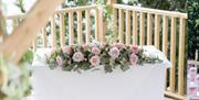 The Osborne Hotel Wedding Fair pictures of seating overlooking the sea and bridal flowers