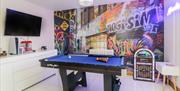 Games room at 2 White Rock Court, Paignton