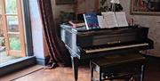 Piano at Winner Street Studios - Residential pottery & Art Studios