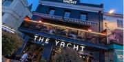 Exterior at night Celebrate England’s Seafood Feast at The Yacht