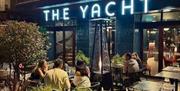 Exterior at night Celebrate England’s Seafood Feast at The Yacht